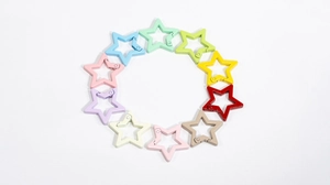 Detailed circle layout of colorful star-shaped spring snap hooks for DIY keychain making