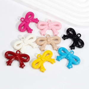 Acrylic lacquer bow charms with star detail for DIY keychains in eight vibrant colors