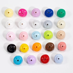 Colorful spiral beads for DIY jewelry with multiple vibrant colors on white backdrop
