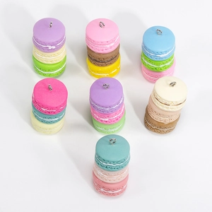 Colorful acrylic macaron cookie charms in seven vibrant shades with silver rings for DIY crafts