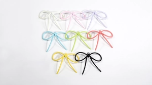 Ciondoli colorati a forma di fiocco in otto tonalità per la creazione di gioielli DIY