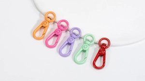 Detail of colorful alloy swivel lobster clasps with matte finish for DIY keychains
