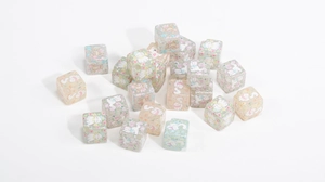 Detailed macro view of square resin beads with cute cat and bear patterns for DIY jewelry