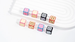 Macro detail of colorful star cube beads on a wavy display for DIY jewelry making