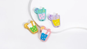 Detail of colorful cartoon beverage cup beads for DIY jewelry with bottom hole