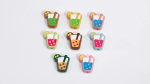 Macro shot of colorful resin bubble tea beads with fruit slices for DIY jewelry