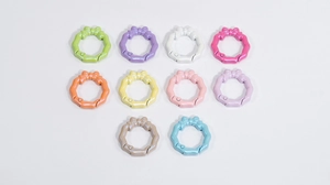 Anelli a molla perlati colorati con eleganti dettagli a fiocco per creazioni fai-da-te