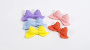 Matte acrylic bow beads in five pastel colors for DIY jewelry and phone chain making