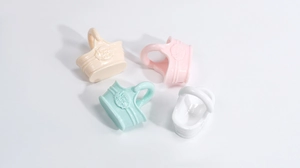 Quatre mini paniers à fleurs en acrylique aux tons macaron pour bricolage et porte-clés