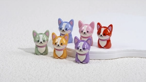Detailed view of colorful acrylic dog beads with glitter ears for DIY craft jewelry making