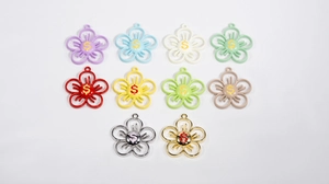 Détails de pendentifs fleurs évidés en alliage avec symbole dollar pour bijoux artisanaux