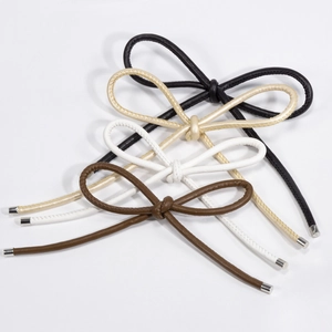 Handmade PU leather woven bow keychains with metallic caps in four classic colors