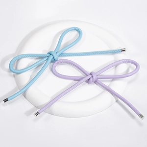 Handmade PU woven bow keychain in light blue and purple with metallic silver caps