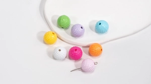 Macro view of colorful faceted acrylic beads for DIY jewelry and phone chain making
