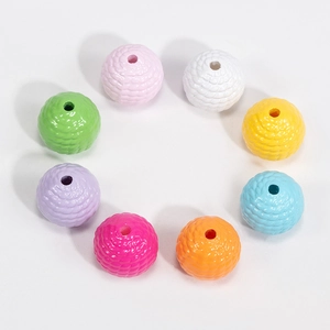 Eight colorful textured acrylic beads with spiral woven patterns for DIY jewelry making