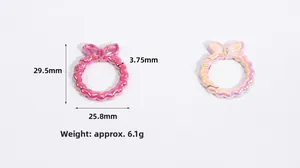 Dettaglio di anelli a molla a forma di fiocco, misure 29,5mm per 25,8mm e peso 6,1g