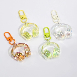 Porte-clés écouteurs en résine irisée colorée en orange, jaune, vert et blanc
