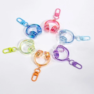 Porte-clés mini-casques en acrylique irisé aux couleurs vives avec fermoir homard