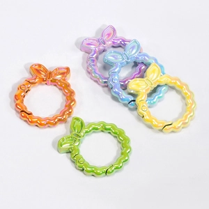 Anelli a molla a forma di fiocco arcobaleno in cinque colori vivaci per portachiavi DIY