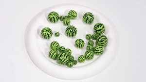 Detailed view of printed acrylic watermelon beads for DIY jewelry and keychain making
