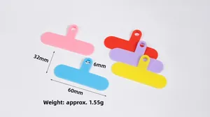 Close-up of colorful phone case gasket connectors with 60x32mm dimensions and 6mm hole