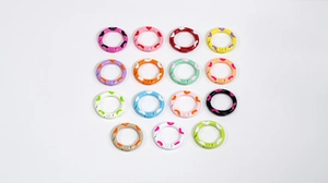 Detailed grid of 15 colorful painted enamel spring rings for DIY keychains and bags