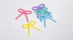 Acrylic candy color bow tie charms in five pastel shades for DIY jewelry making