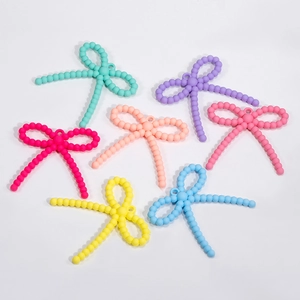 Colorful acrylic bow pendants for DIY jewelry making in vibrant macaron shades