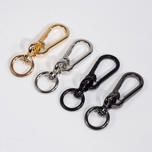 Set of four colorful polished metal spring carabiners with swivel rings for DIY bags