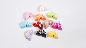 Macro view of colorful acrylic rainbow charms for DIY jewelry and keychain making