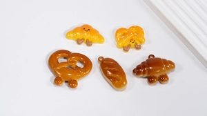 Set of 5 realistic resin bread pendants including croissants and baguettes for DIY crafts