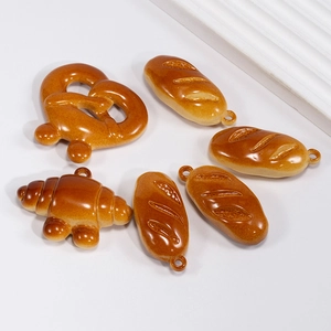 Cute resin bread pendants including croissant and pretzel shapes for DIY keychains