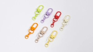 Set of seven colorful matte lacquer lobster clasps with square spring rings for DIY crafts