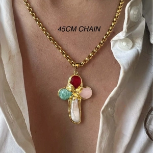 Detail of 45cm gold chain necklace with colorful gemstone cross pendant and baroque pearl