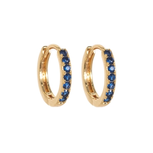 Detailed close-up of 14K gold plated hoop earrings featuring seven inset blue sapphires