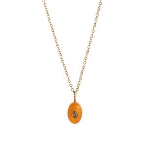 Detailed view of teardrop pendant with 18k gold plating and center clear stone