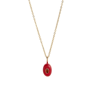 Detail of 18k gold plated necklace featuring a red water drop pendant with small gemstone