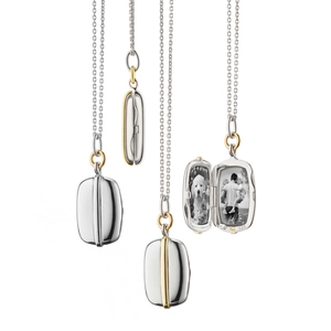 Macro view of vintage locket pendants showing front, side and internal photo frames