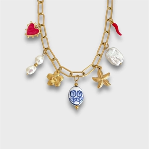 Gouden paperclip ketting met barokparels, hartbedel en zeesterhangers voor dames