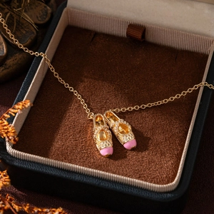 Elegant gold ballet slippers pendant necklace with pink enamel and crystals in a gift box