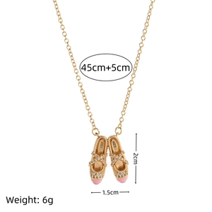 Pink ballet slippers necklace in gold finish with sparkling diamonds for women