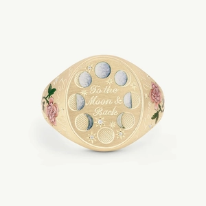 Detail of gold signet ring with To the Moon and Back engraving and rose enamel art