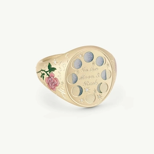 Detail of gold signet ring with Moon & Back engraving and pink rose painted side