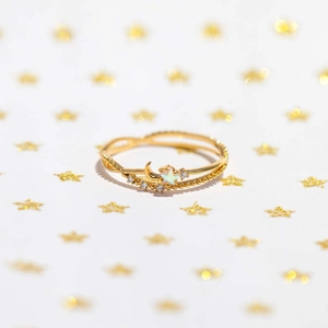 Star and moon gold double-layer ring with sparkling zircon stones and opal star detail