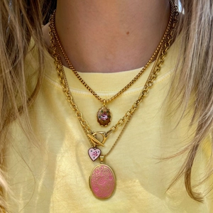 Three-layer vintage gold-plated necklace set with floral oval and pink heart pendants