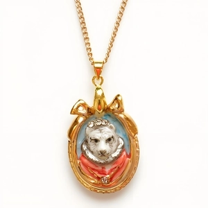 Vintage gold relief necklace featuring a royal white bear portrait with red robes and crown