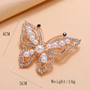 Elegant gold butterfly brooch with pearls and rhinestones, 5x4cm size, weight 14g