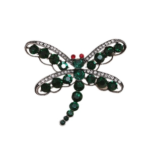 Broche libellule vintage avec cristaux vert foncé et ailes argentées incrustées de diamants