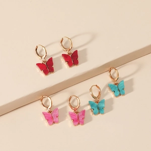 Minimalistische 3-delige vlinder oorbellenset in dieprood, roze en turquoise kleuren