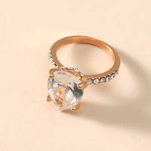 Sparkling pear-shaped diamond ring in rose gold finish with paved band for women